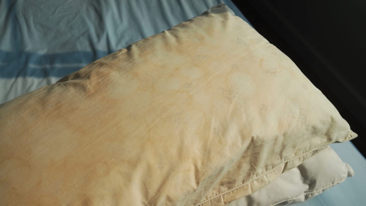 What Those Yellow Stains Say About Your Sleep 5 What Those Yellow Stains Say About Your Sleep - white pillow yellow stain dp104174364 dnoh