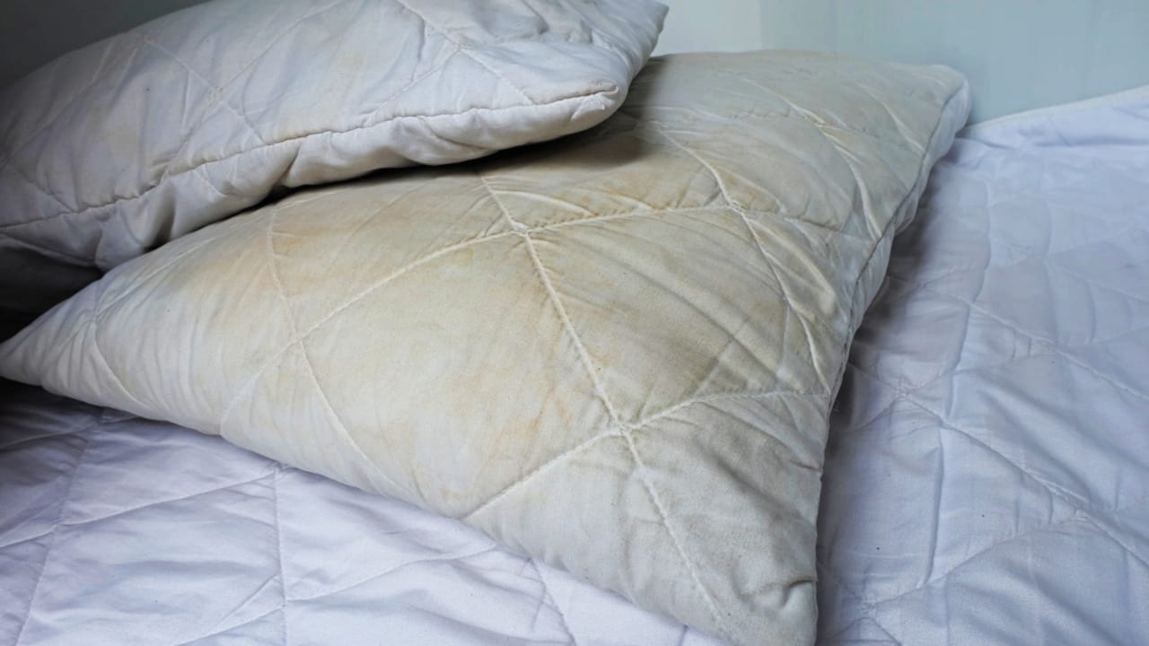 What Those Yellow Stains Say About Your Sleep 2 What Those Yellow Stains Say About Your Sleep - white pillow yellow stain dp207607756 dnoh