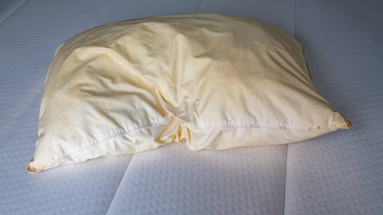 What Those Yellow Stains Say About Your Sleep 4 What Those Yellow Stains Say About Your Sleep - white pillow yellow stain dp352287658 dnoh