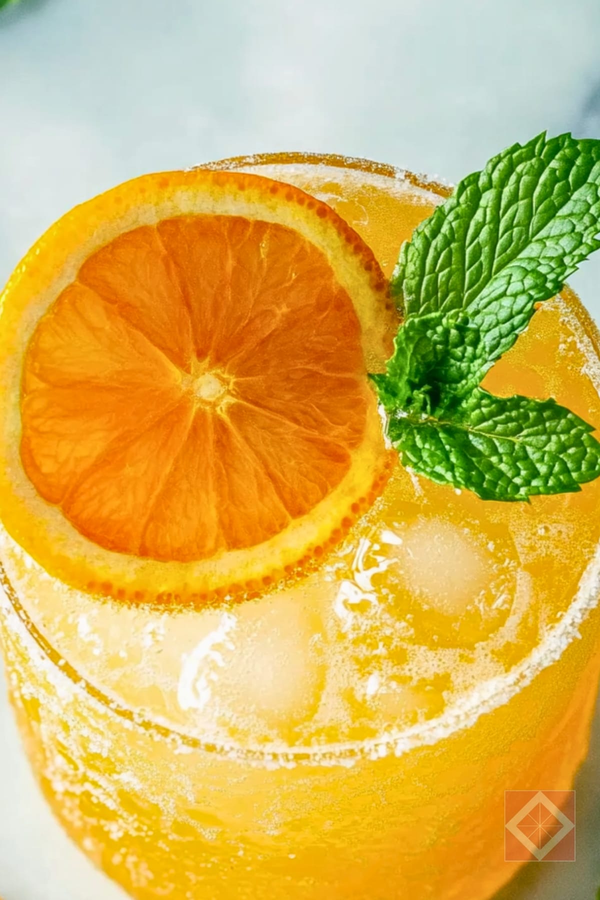 21 Refreshing Mocktail Recipes to Transform Your Gatherings 6 21 Refreshing Mocktail Recipes to Transform Your Gatherings - Orange Mocktail pin 1 midia