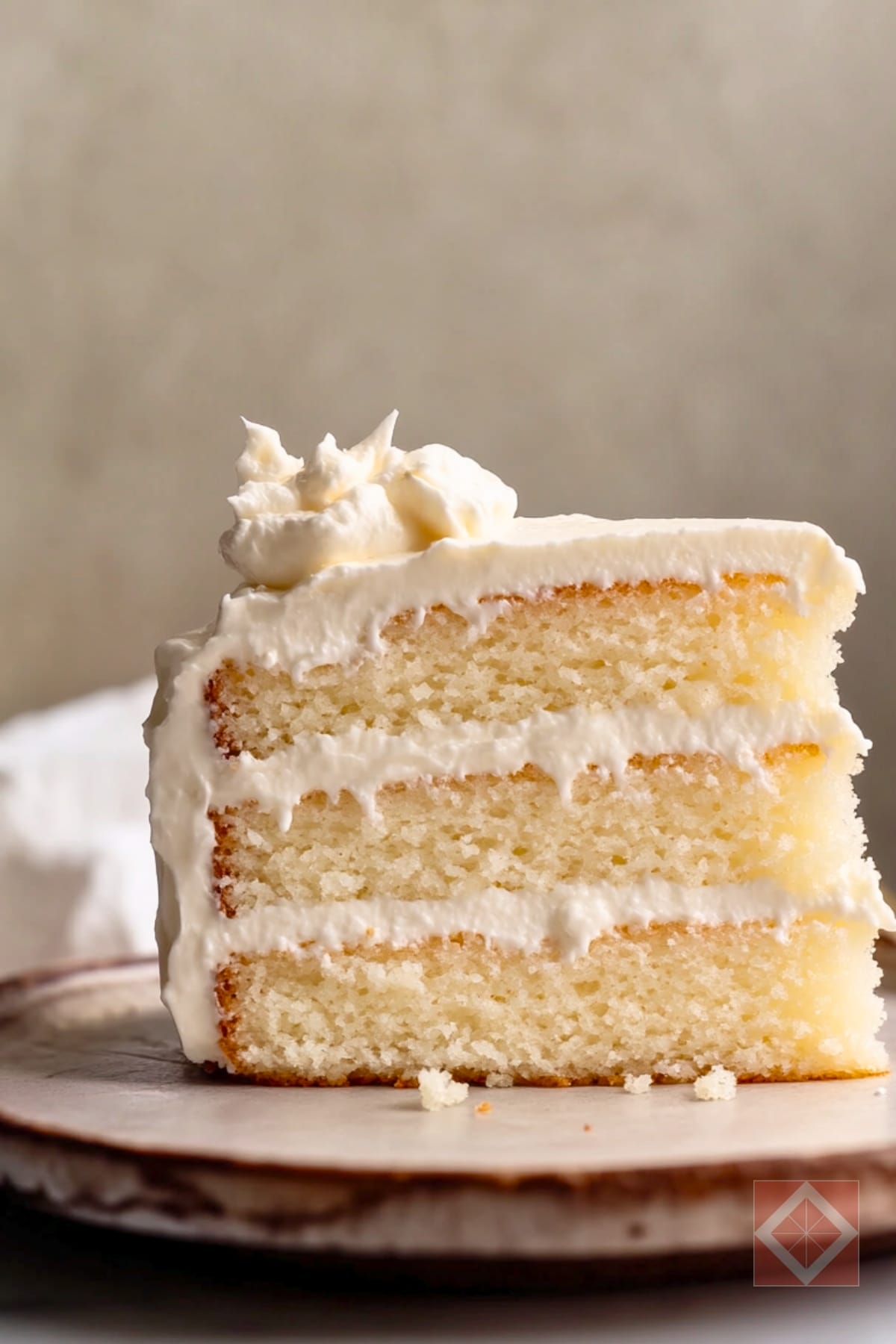 Indulgent Layers of White Mountain Cake Delight 3 Indulgent Layers of White Mountain Cake Delight - White Mountain Layer Cake with Marshmallow Buttercream pin 1 midia