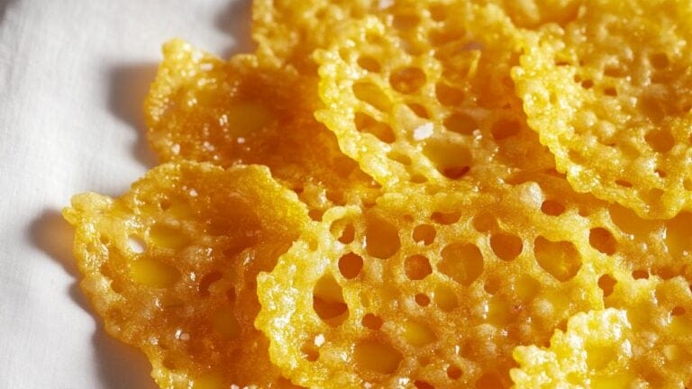 4 Cheesy Carnivore Snacks You Didn’t Know Your Air Fryer Could Make 8 4 Cheesy Carnivore Snacks You Didn’t Know Your Air Fryer Could Make - Crispy Cheddar Chips with Butter Drizzle midia