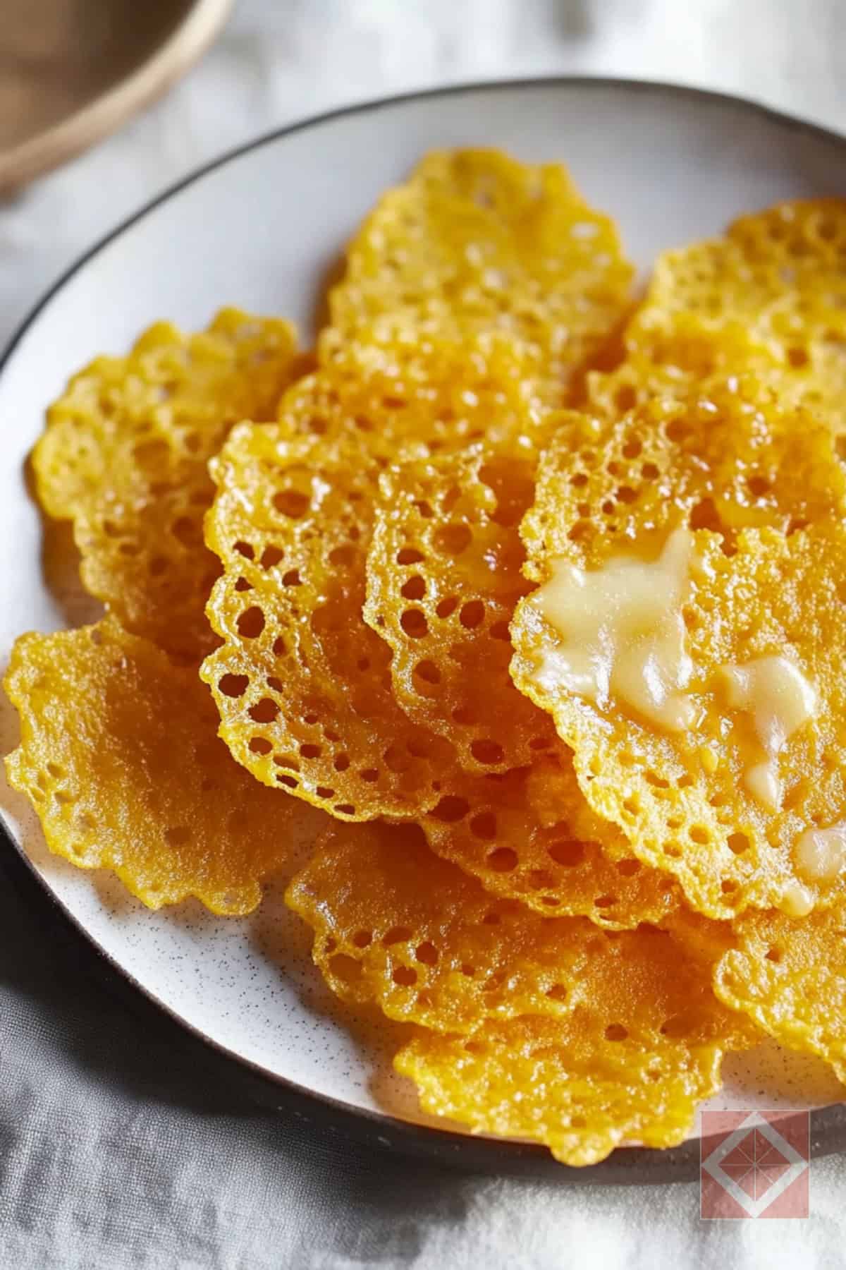 4 Cheesy Carnivore Snacks You Didn’t Know Your Air Fryer Could Make 5 4 Cheesy Carnivore Snacks You Didn’t Know Your Air Fryer Could Make - Crispy Cheddar Chips with Butter Drizzle pin 1 midia