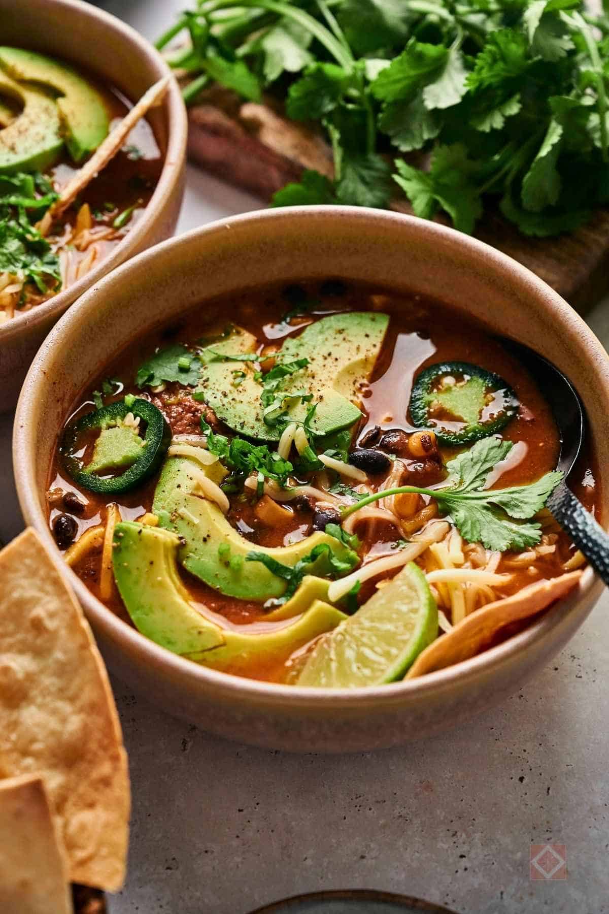 Creamy Chicken Enchilada Soup That’ll Warm You Right Up - Creamy Chicken Enchilada Soup 7