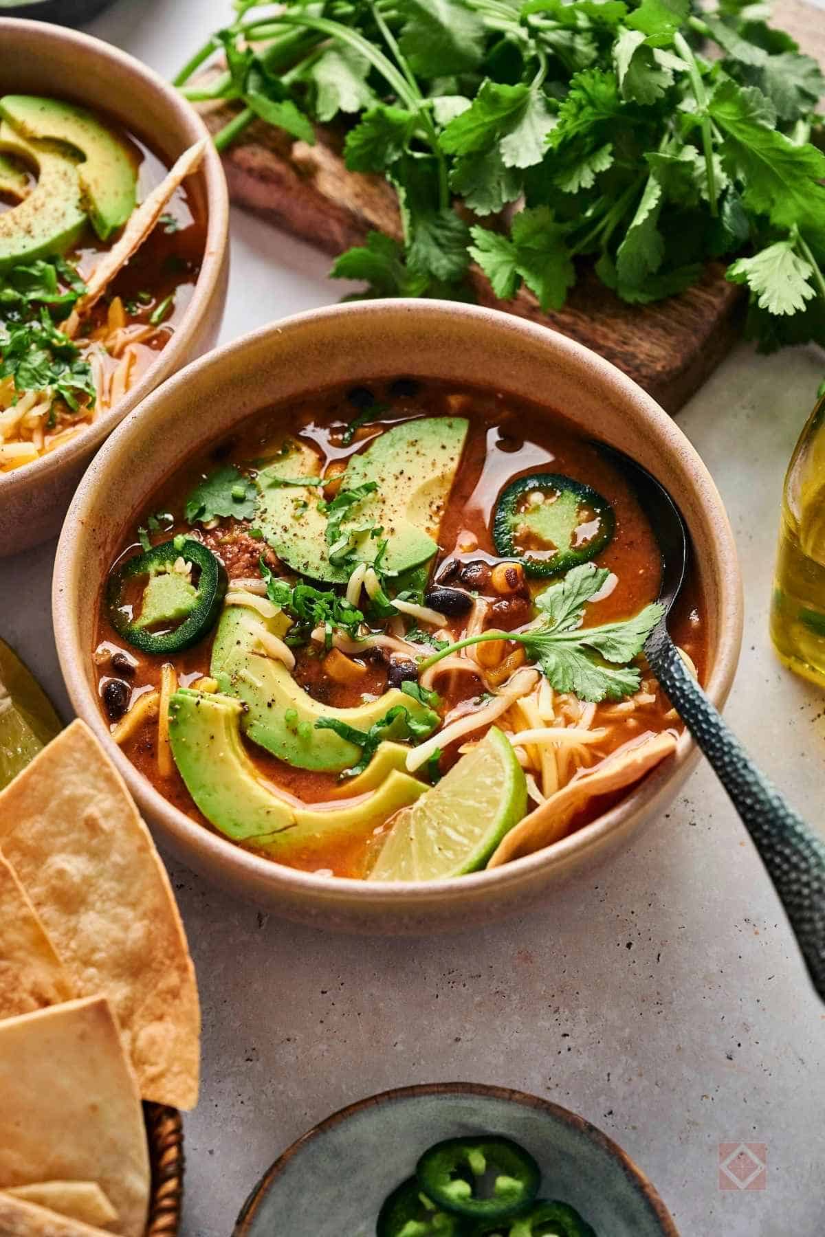 Creamy Chicken Enchilada Soup That’ll Warm You Right Up - Creamy Chicken Enchilada Soup 8