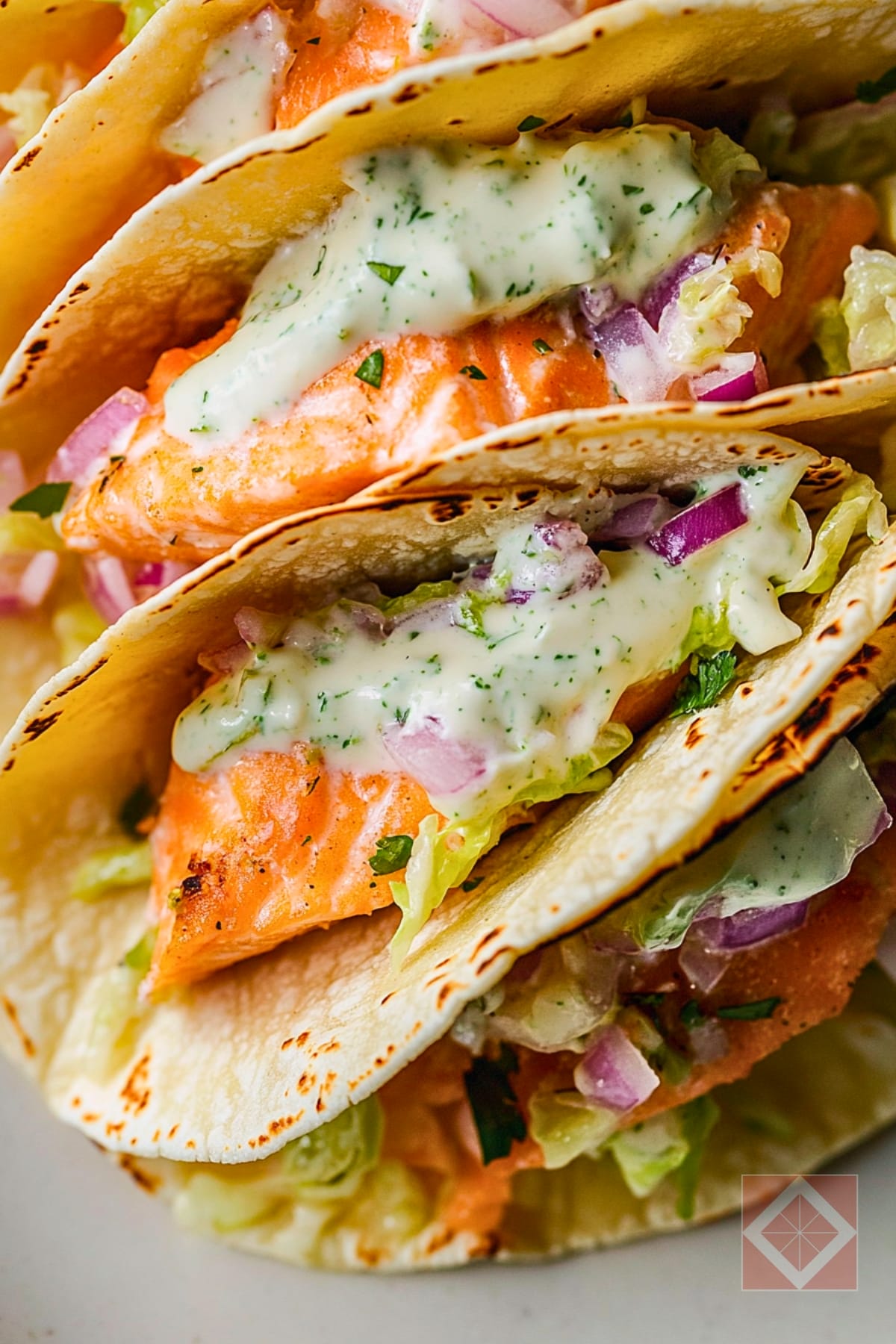 14 Dinner Recipes for Two: Burgers, Tacos, Sandwiches, and Pizza 5 14 Dinner Recipes for Two: Burgers, Tacos, Sandwiches, and Pizza - Salmon Tacos with Cabbage Slaw Lime Crema pin 1 midia