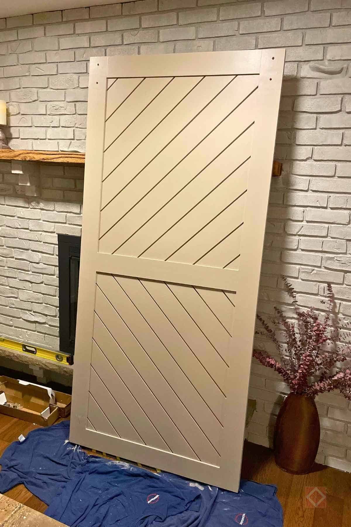 How I Built $1,000-Look Custom Double Barn Doors for Just $300 (and Hid a Secret Media Closet) 5 How I Built $1,000-Look Custom Double Barn Doors for Just $300 (and Hid a Secret Media Closet) - custom diy double barn doors 9