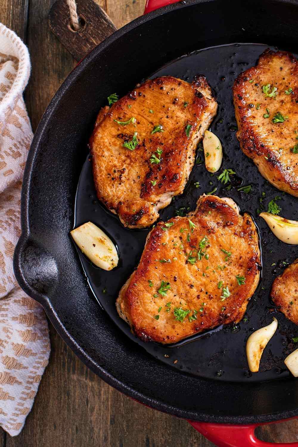 The Only Pan-Seared Pork Chops Recipe You'll Ever Need (Juicy Every Time) 3 The Only Pan-Seared Pork Chops Recipe You'll Ever Need (Juicy Every Time) - pork chops garlic butter s2274352865dnoh
