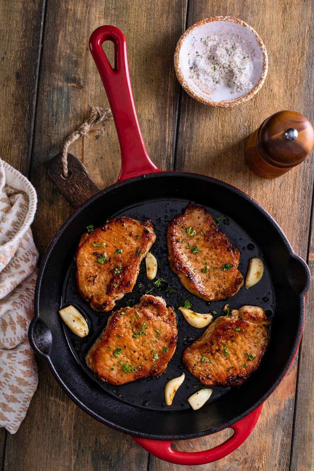 The Only Pan-Seared Pork Chops Recipe You'll Ever Need (Juicy Every Time) 2 The Only Pan-Seared Pork Chops Recipe You'll Ever Need (Juicy Every Time) - pork chops garlic butter s2394667983dnoh