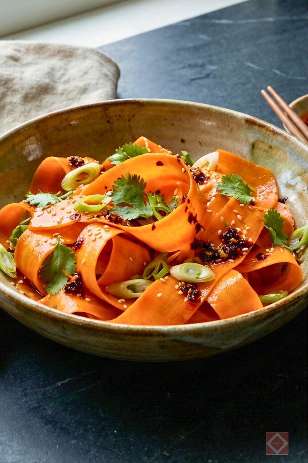 The Viral "Retinol Salad" Recipe (Spicy Sesame Carrot Ribbons That Actually Taste Good) 2 The Viral "Retinol Salad" Recipe (Spicy Sesame Carrot Ribbons That Actually Taste Good) - retinol salad 3